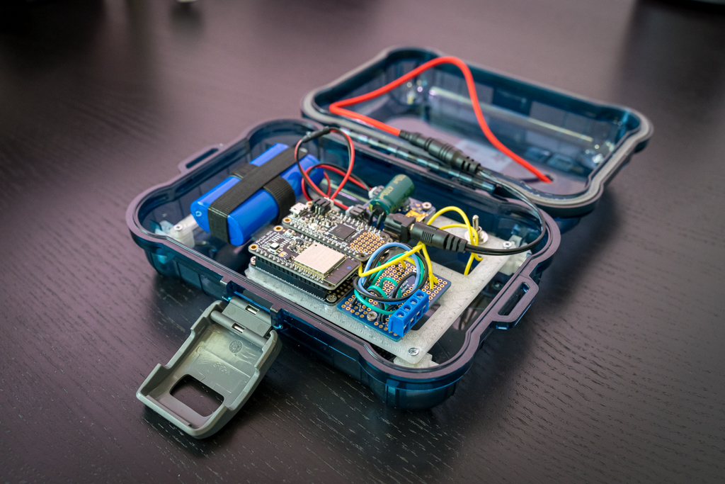 Boards and other components inside the holding case.