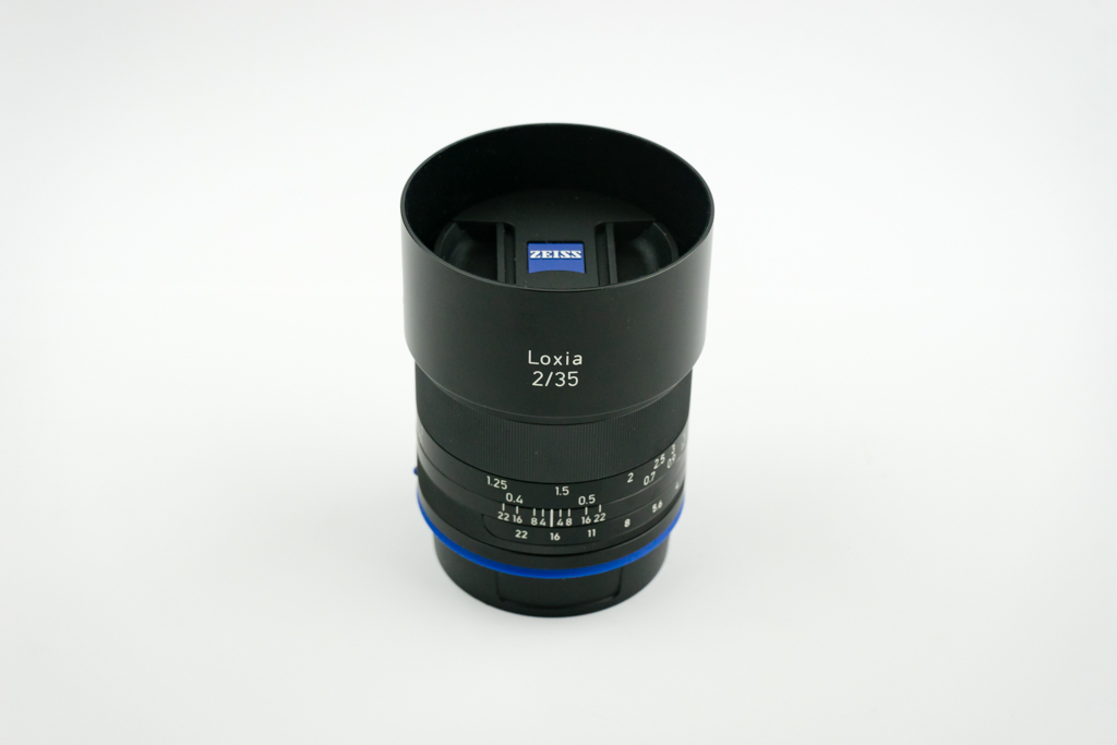 Loxia 35mm f/2 with hood.