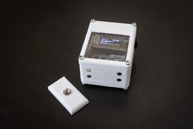 Camera controller and tripod mount.