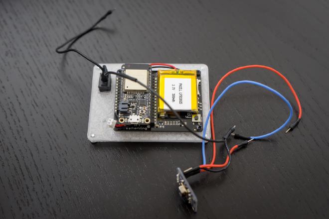 Huzzah32 Feather inserted into the 3.4” TFT Featherwing header. Notice pins soldered at the end of the wires.