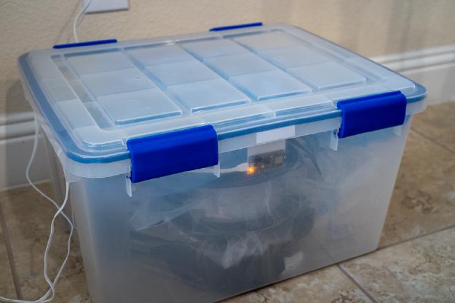 Bluefruit Sense board inside plastic container