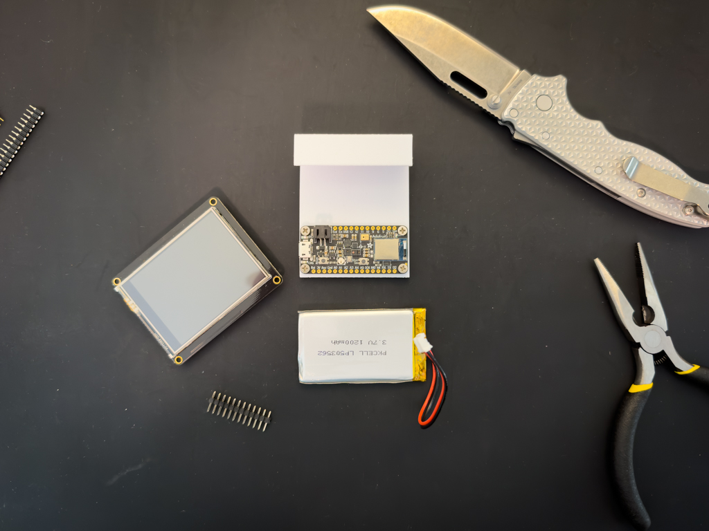 Bluefruit Sense with Adafruit’s FeatherWing and Li-Ion battery.