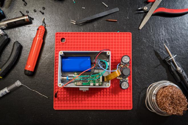 Hardware components inside 3D printed box.