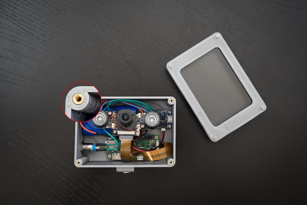3d-printed case with all components inside. Note brass inserts.