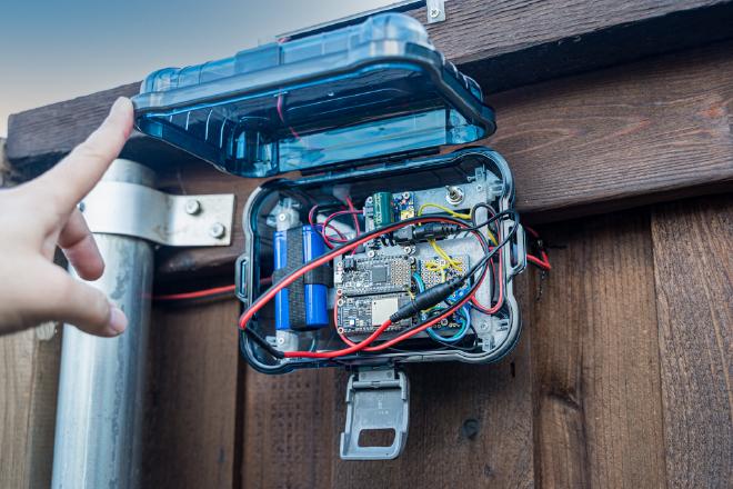 Case and components installed on the fence.