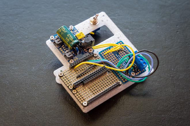 Assembled boards on supporting frame.